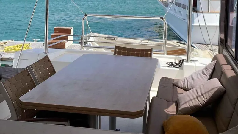  Yacht Photos Pics Bali 4.1 2019 yacht with cozy seating area by the water.