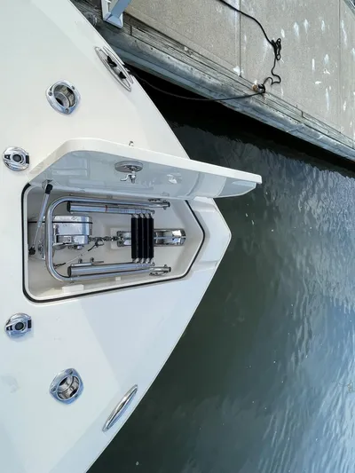  Yacht Photos Pics 2020 Ocean Scout 277 boat docked at marina, top view of bow and water.