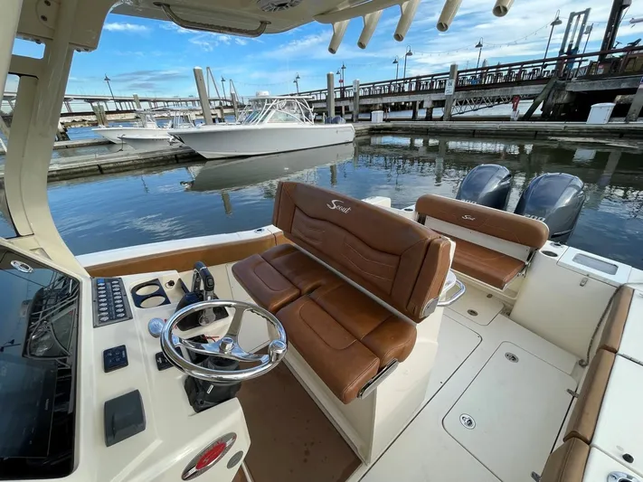  Yacht Photos Pics 2020 Ocean Scout 277 boat with leather seating, docked at marina.