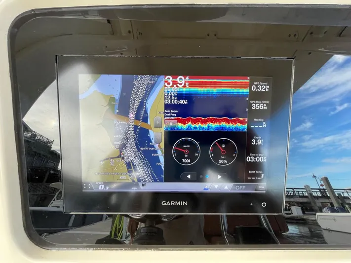  Yacht Photos Pics Garmin marine display on 2020 Ocean Scout 277 boat, showing navigation and sonar data.