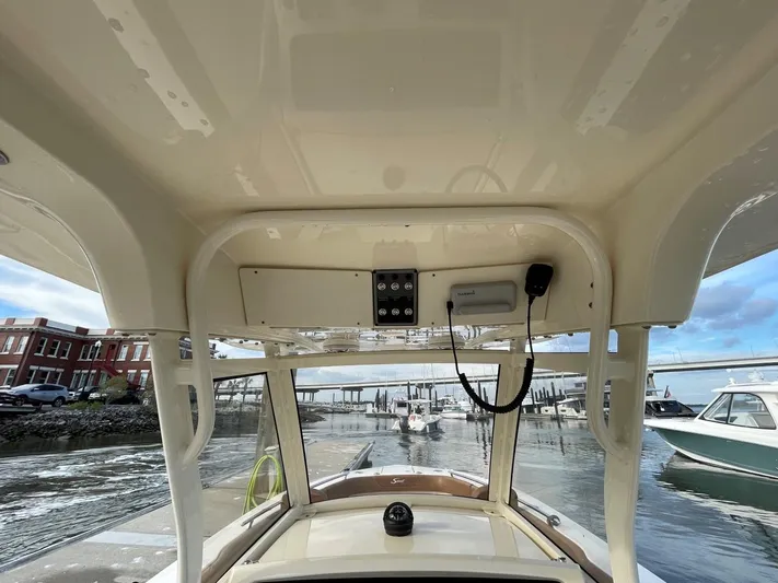  Yacht Photos Pics Interior view of 2020 Ocean Scout 277 boat at a marina.