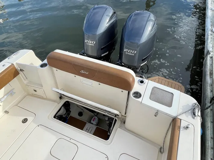  Yacht Photos Pics Ocean Scout 277 boat, 2020 model, with twin Yamaha 200 engines docked on calm water.