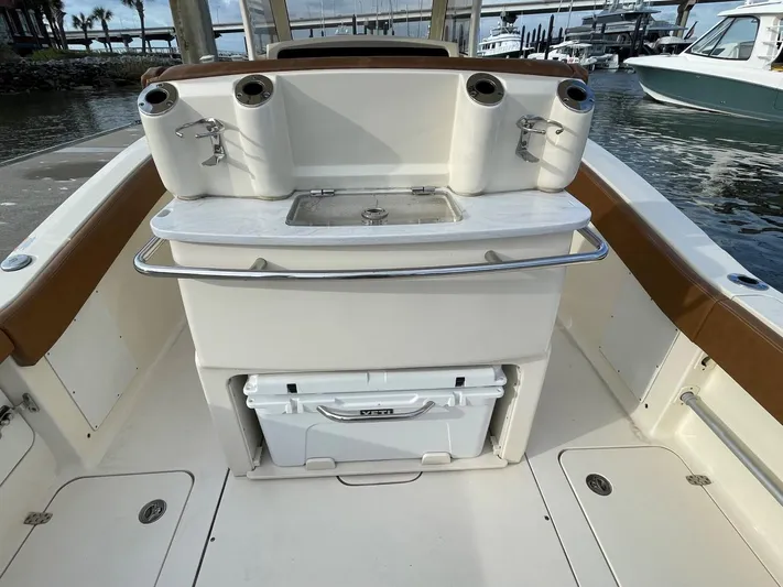  Yacht Photos Pics 2020 Ocean Scout 277 boat with fishing rod holders and cooler on deck.