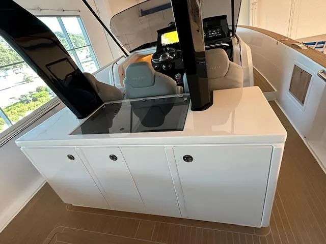 Pardo 38 Yacht Photos Pics 2023 Pardo Yachts 38 interior with modern helm and seating area.