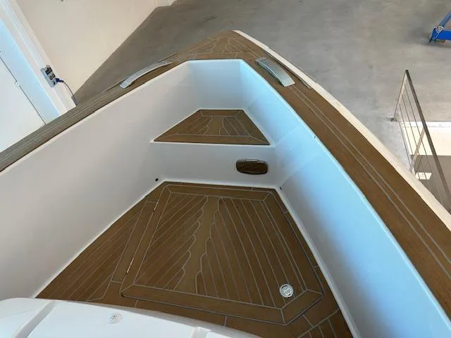 Pardo 38 Yacht Photos Pics 2023 Pardo Yachts 38 deck with sleek wood finish and modern design.