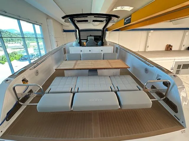 Pardo 38 Yacht Photos Pics 2023 Pardo Yachts 38 interior with seating and table in a spacious cabin.