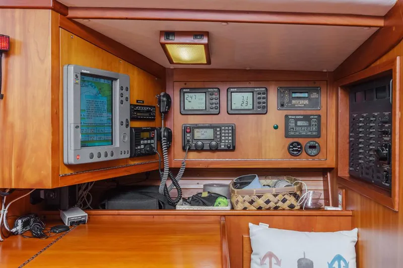 Lark Yacht Photos Pics Navigation equipment on a 2001 J Boats 46, featuring control panels and communication devices.