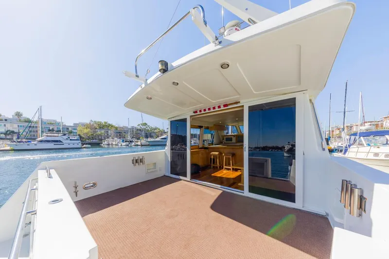 Katerina Yacht Photos Pics 1996 Navigator 5300 Classic yacht with spacious deck and marina view.