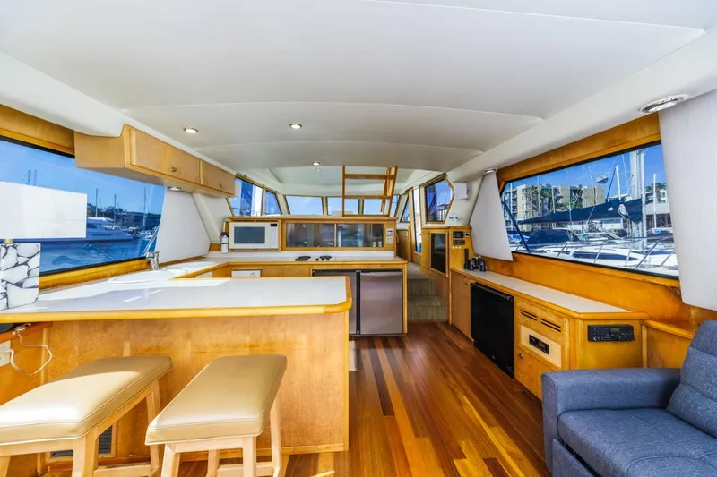Katerina Yacht Photos Pics Interior of 1996 Navigator 5300 Classic yacht with wooden flooring and modern amenities.