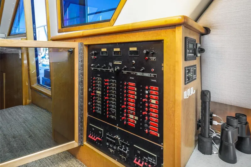 Katerina Yacht Photos Pics Control panel inside 1996 Navigator 5300 Classic yacht, featuring switches and gauges.