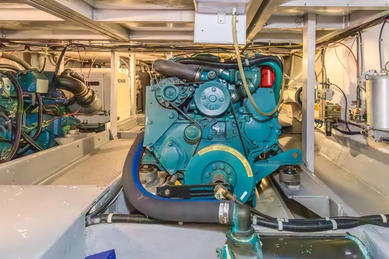 Katerina Yacht Photos Pics Engine room of 1996 Navigator 5300 Classic yacht, showcasing machinery and components.
