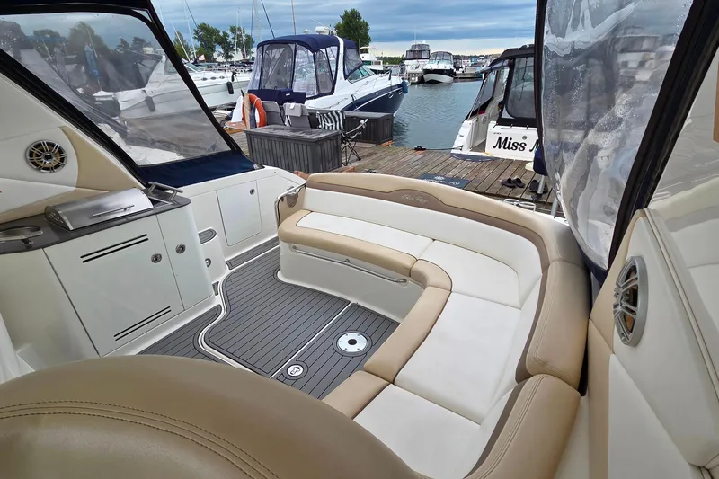  Yacht Photos Pics Interior view of 2013 Sea Ray 370 Sundancer yacht at marina dock.