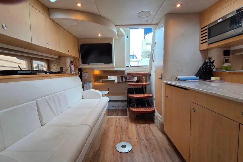  Yacht Photos Pics Interior of 2013 Sea Ray 370 Sundancer yacht with modern amenities and cozy seating.