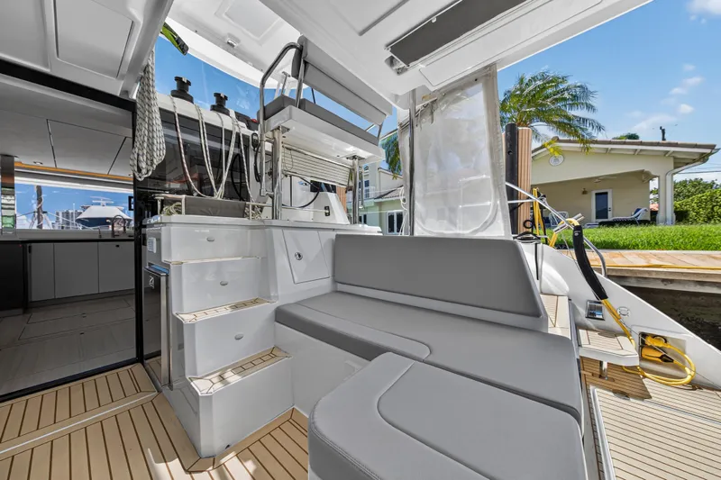 Ten-seven Freedom Yacht Photos Pics Modern Leopard 42 yacht interior, featuring sleek seating and elegant design, 2023 model.