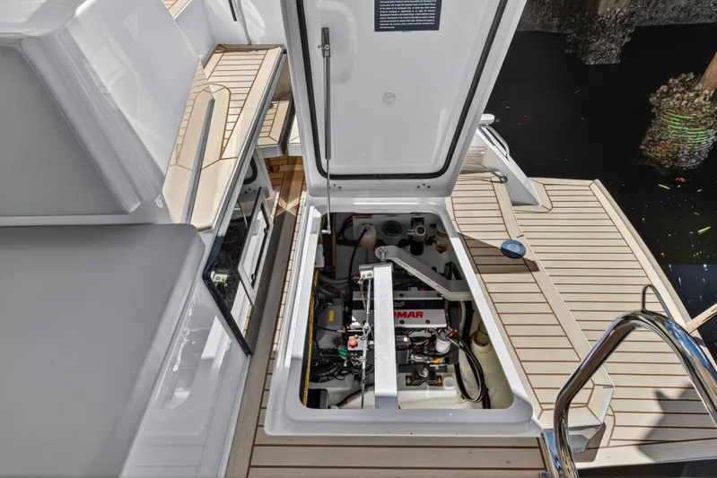 Ten-seven Freedom Yacht Photos Pics Engine compartment of 2023 Leopard 42 yacht, showcasing Yanmar engine and deck details.