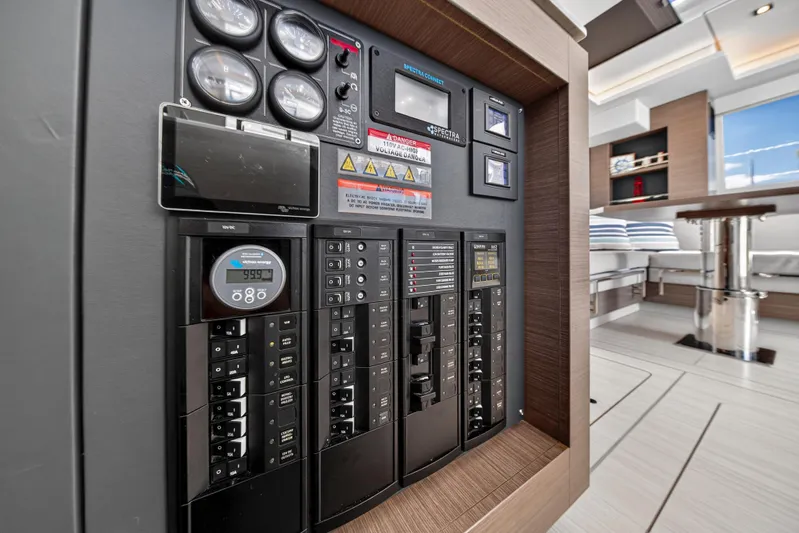 Ten-seven Freedom Yacht Photos Pics Electrical control panel on 2023 Leopard 42 yacht interior, featuring modern design and gauges.