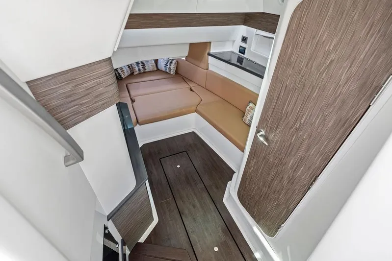  Yacht Photos Pics 2022 Aviara AV40 OB cabin interior with modern seating and wood accents.