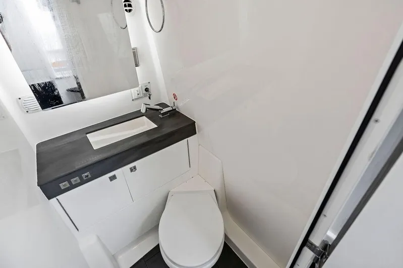  Yacht Photos Pics 2022 Aviara AV40 OB bathroom with modern sink and toilet design.