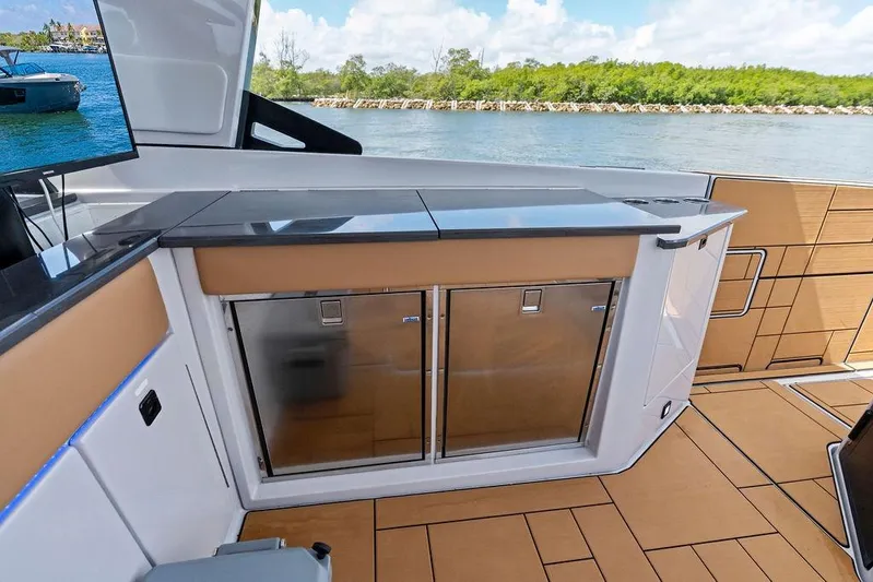  Yacht Photos Pics Luxury interior of 2022 Aviara AV40 OB boat with sleek cabinetry and scenic water view.
