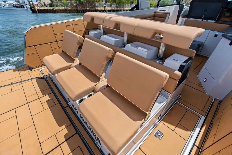  Yacht Photos Pics Luxury seating on 2022 Aviara AV40 OB boat, featuring tan upholstery and sleek design.