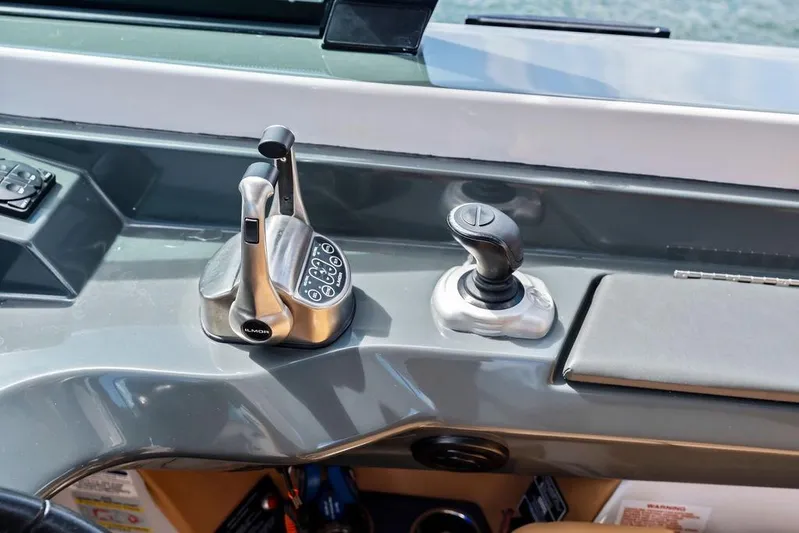  Yacht Photos Pics Control panel of 2022 Aviara AV40 OB boat with joystick and throttle levers.