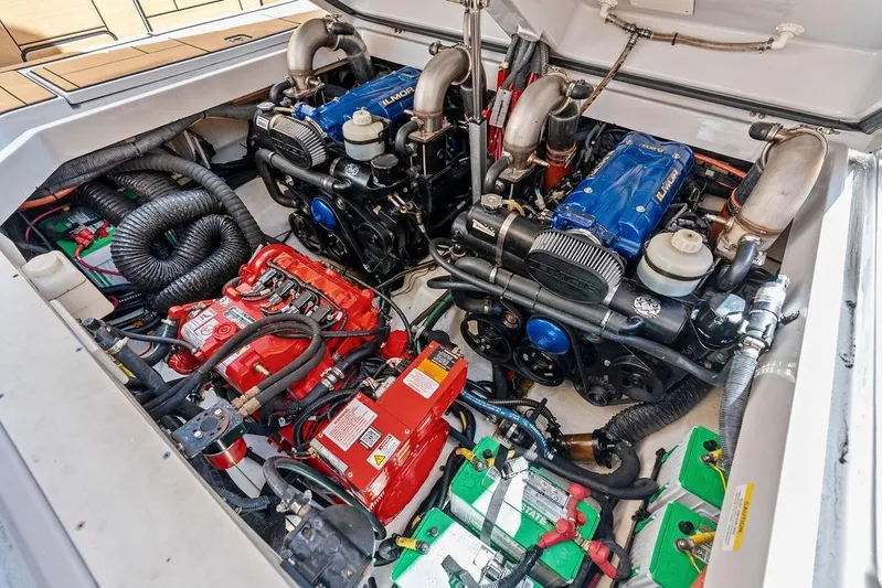  Yacht Photos Pics Engine compartment of 2022 Aviara AV40 OB, showcasing dual engines and battery setup.
