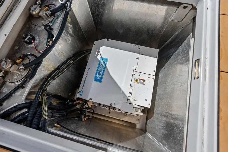  Yacht Photos Pics 2022 Aviara AV40 OB engine compartment with Seakeeper stabilizer unit and wiring.