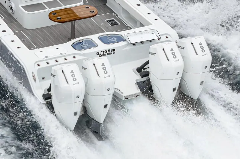  Yacht Photos Pics 2024 Freeman 47 boat with four powerful Mercury 400 outboard engines on the water.