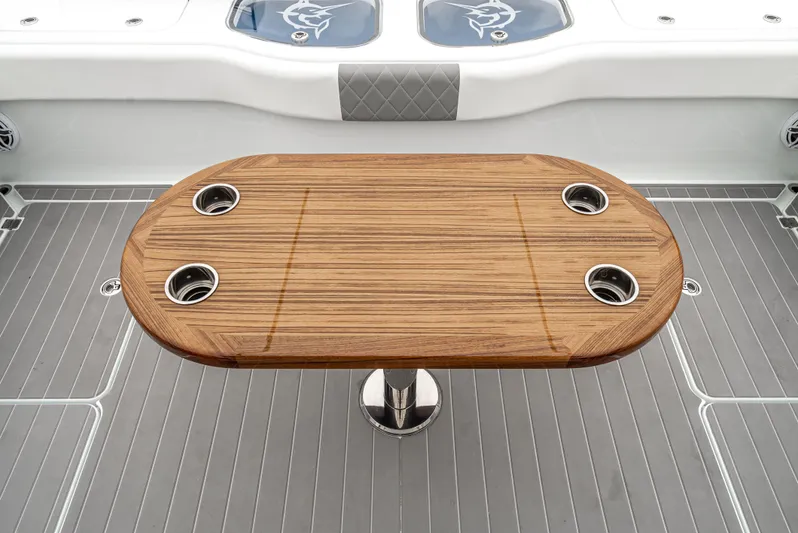  Yacht Photos Pics Freeman 47 boat interior with wooden table and cup holders, 2024 model.