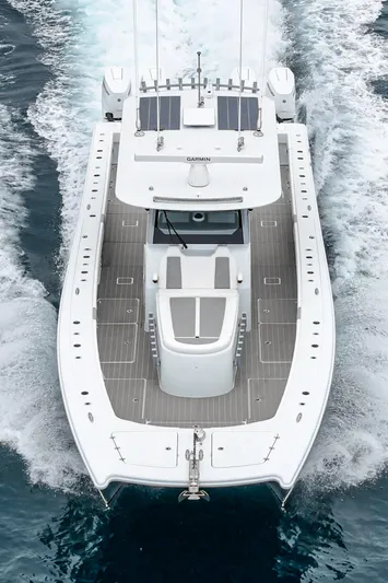  Yacht Photos Pics Freeman 47 boat cruising on water, aerial view, 2024 model.