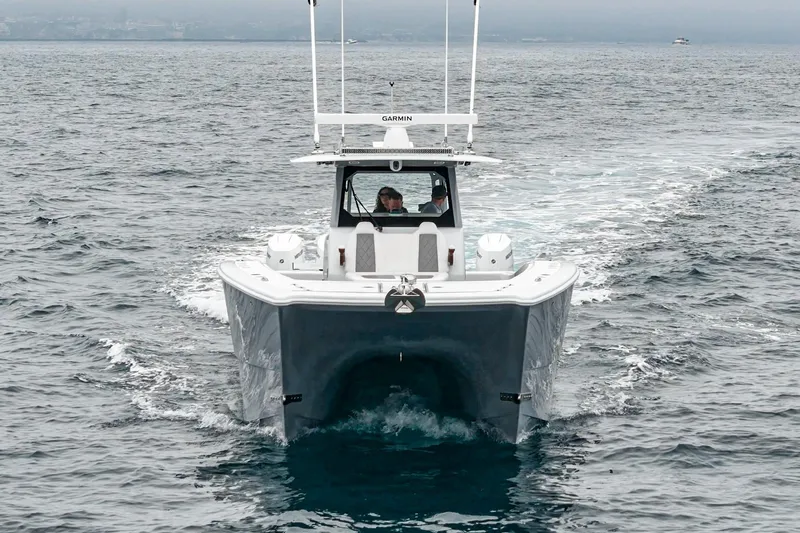  Yacht Photos Pics 2024 Freeman 47 boat cruising on open water, front view.