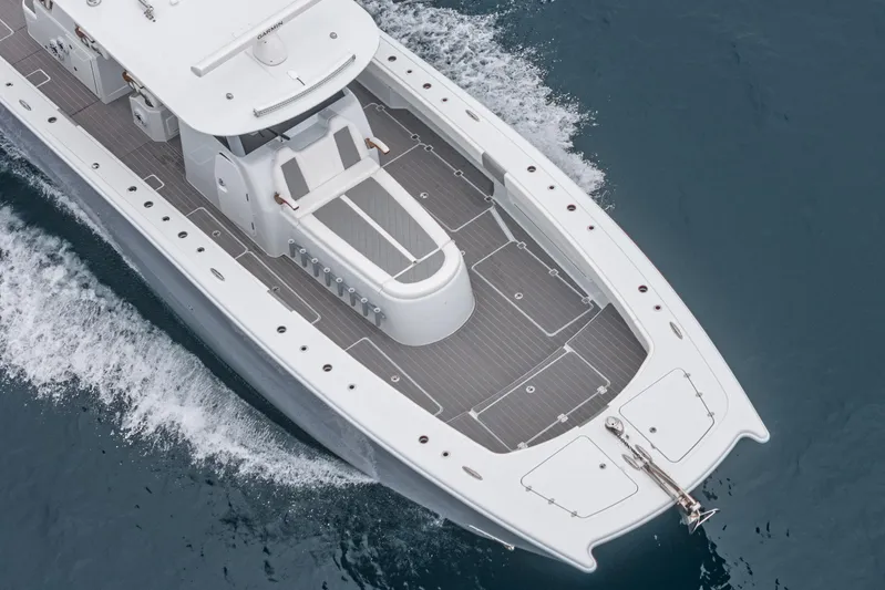  Yacht Photos Pics 2024 Freeman 47 yacht cruising on open water, aerial view.