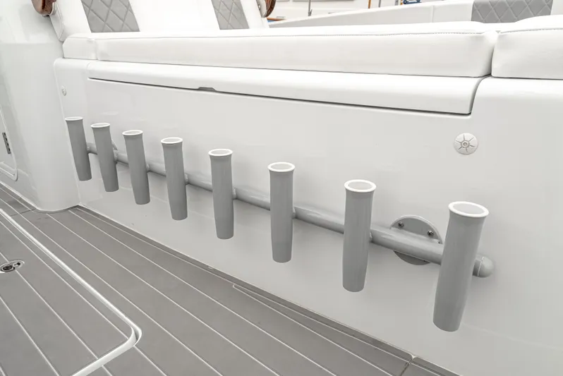  Yacht Photos Pics Rod holders on a 2024 Freeman 47 boat, featuring sleek white and gray design.