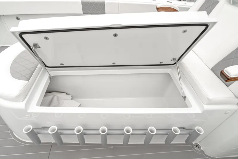  Yacht Photos Pics Open storage compartment on 2024 Freeman 47 boat with rod holders.