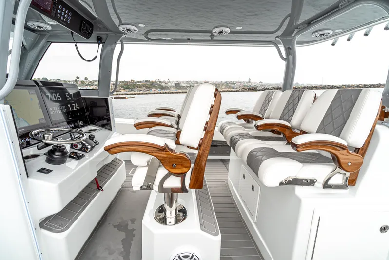  Yacht Photos Pics 2024 Freeman 47 boat interior with luxurious seating and advanced navigation controls.