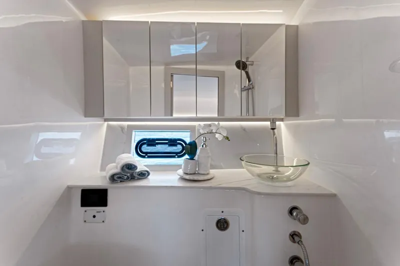  Yacht Photos Pics Luxurious bathroom interior of 2026 Valiatt 350 GT yacht with modern fixtures and elegant design.