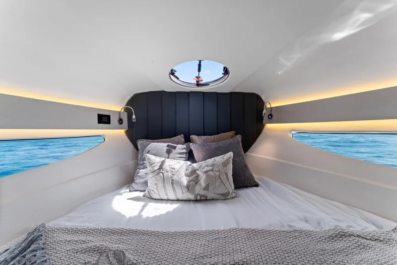  Yacht Photos Pics Luxurious interior cabin of 2026 Valiatt 350 GT yacht with cozy bedding and ocean view.
