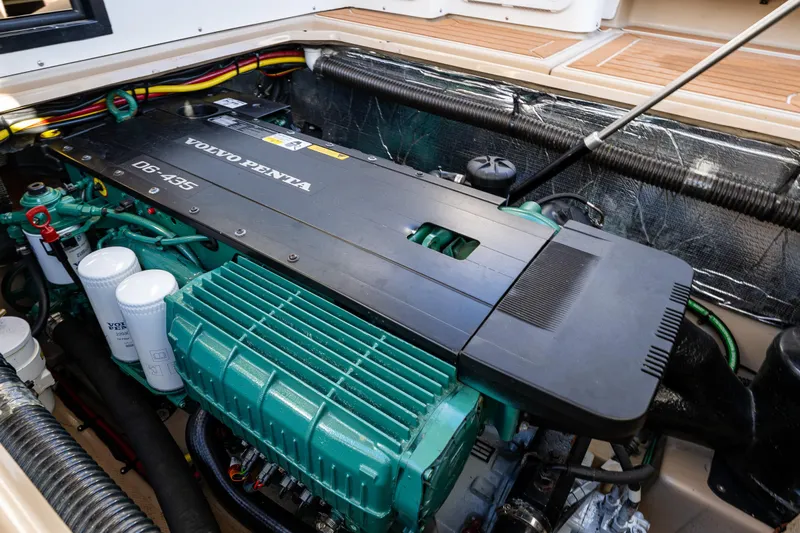 Awol Yacht Photos Pics Volvo Penta engine in 2016 Cutwater 30 Command Bridge boat, showcasing detailed components.