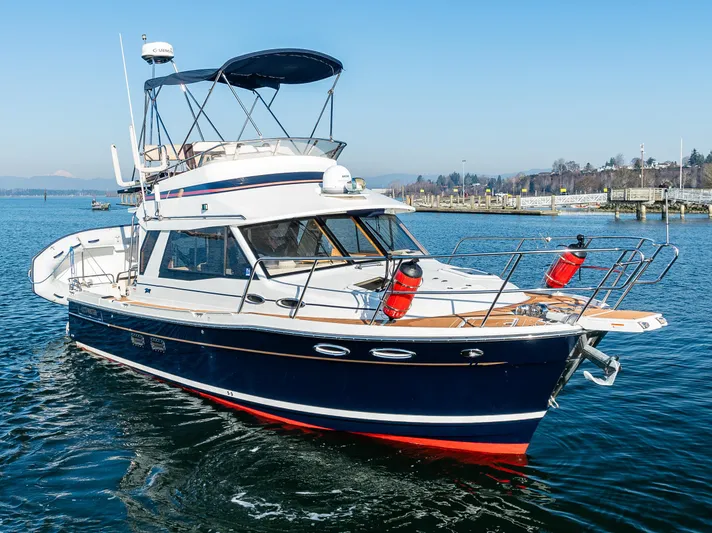 Awol Yacht Photos Pics 2016 Cutwater 30 Command Bridge boat on water, featuring sleek design and spacious deck.