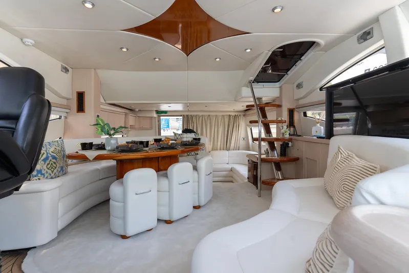 Java Yacht Photos Pics Luxurious interior of 2004 Sunseeker Manhattan 64 yacht with elegant seating and modern design.