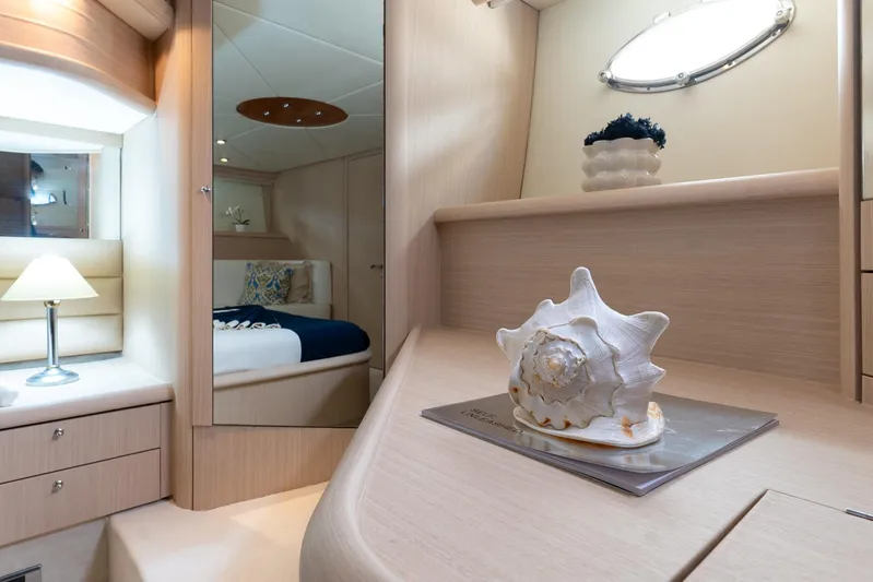 Java Yacht Photos Pics Luxurious cabin interior of 2004 Sunseeker Manhattan 64 yacht with elegant decor.