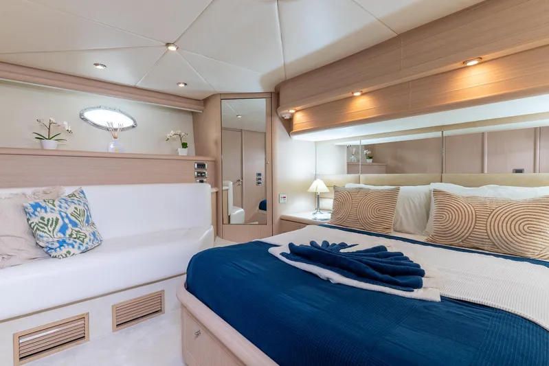 Java Yacht Photos Pics Luxurious bedroom interior of 2004 Sunseeker Manhattan 64 yacht with elegant decor.