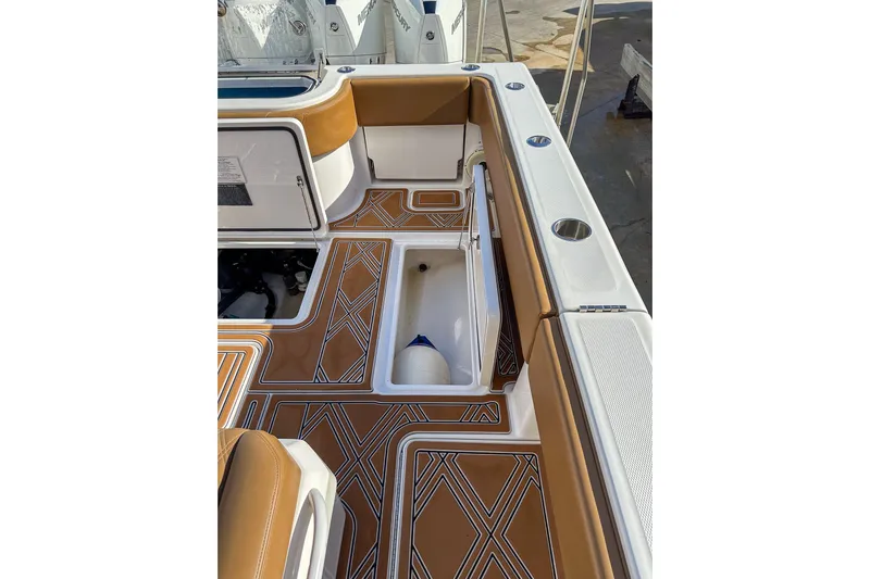  Yacht Photos Pics 2022 Invincible 39 Open Fisherman boat interior with stylish deck design and storage compartments.