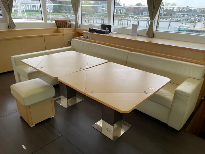 Phoenicia Yacht Photos Pics Interior of Lagoon 620 yacht, 2014, featuring elegant seating area.