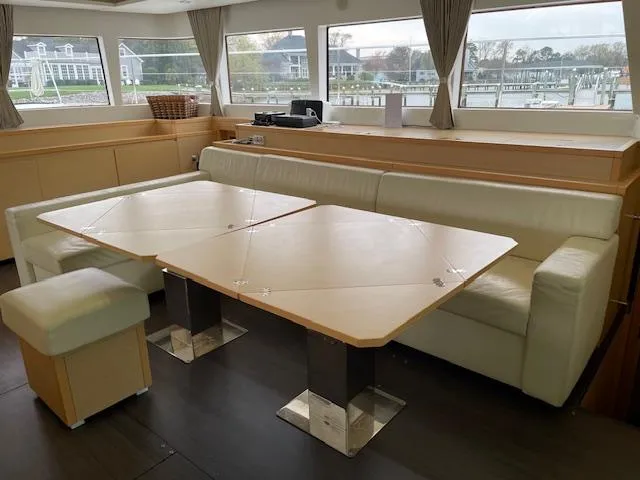 Phoenicia Yacht Photos Pics Interior of a 2014 Lagoon 620 yacht with elegant seating area.