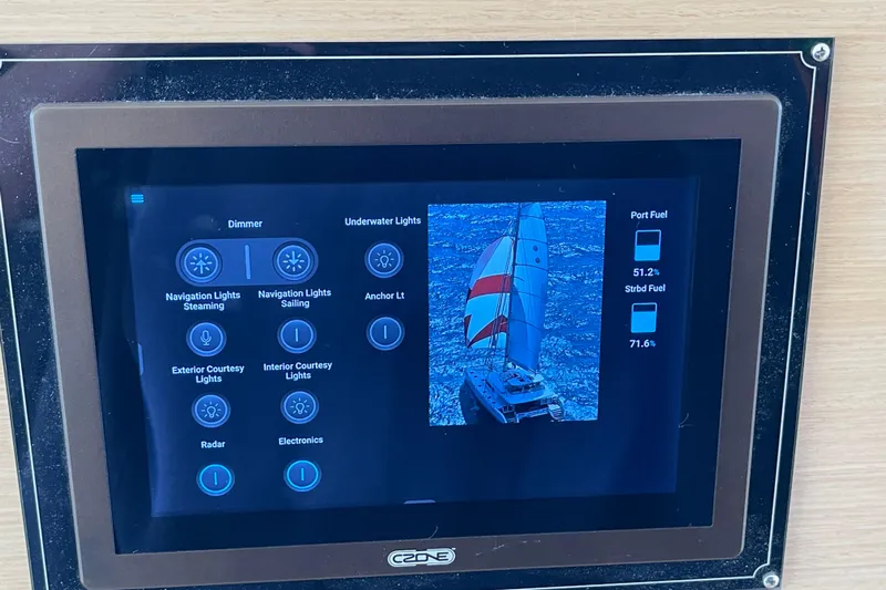 Phoenicia Yacht Photos Pics Touchscreen control panel on a 2014 Lagoon 620 yacht, displaying navigation and fuel information.