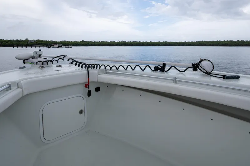  Yacht Photos Pics 2018 Yellowfin 36 Offshore boat interior with calm water and cloudy sky.
