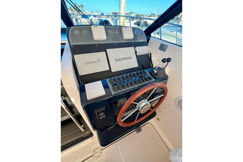 Blue Pearl Yacht Photos Pics Helm of 2005 Tiara Yachts 3200 Open with Garmin navigation system.