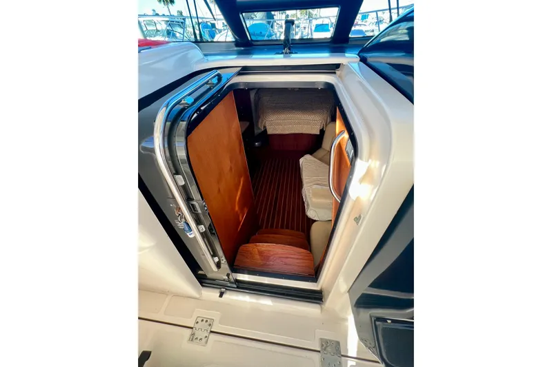 Blue Pearl Yacht Photos Pics 2005 Tiara Yachts 3200 Open cabin interior with wood accents and seating.