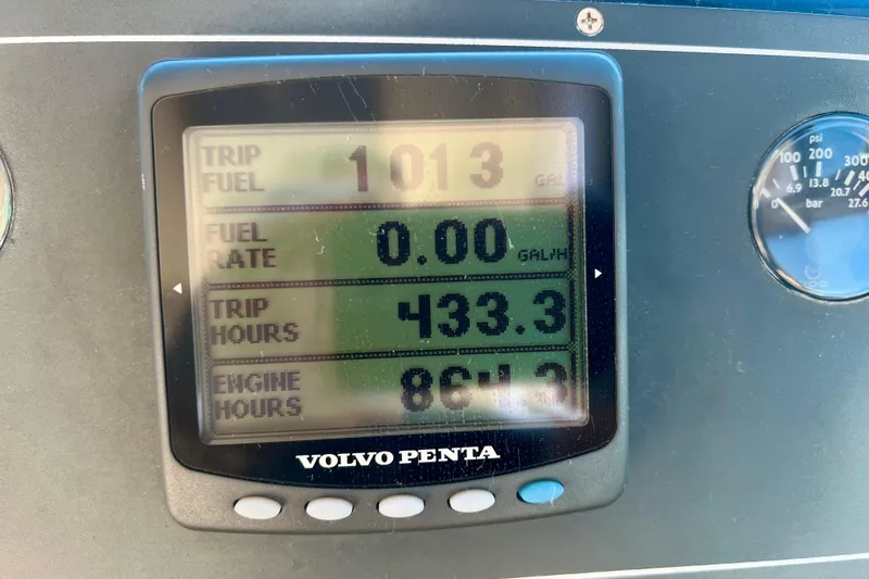 Blue Pearl Yacht Photos Pics Volvo Penta display on 2005 Tiara Yachts 3200 Open showing trip and engine data.